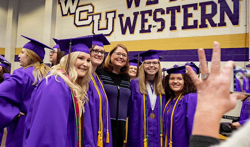 Graduates posing