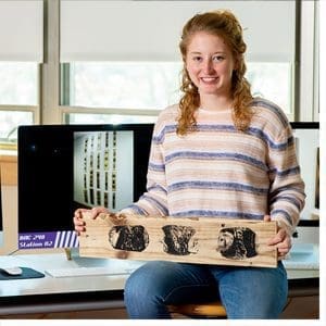 Art meets trash, as Grace Woodard prepares a presentation on environmental damage caused by garbage that draws upon her artistic ability, for the upcoming National Conference on Undergraduate Research.
