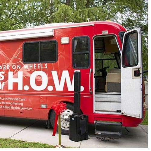 WSSU cuts ribbon for the second university-branded mobile clinic on Thursday, May 17.