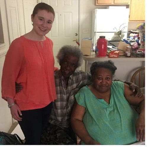 UNCSA Music student Grace Pfleger with community members she regularly visits through Meals-on-Wheels.