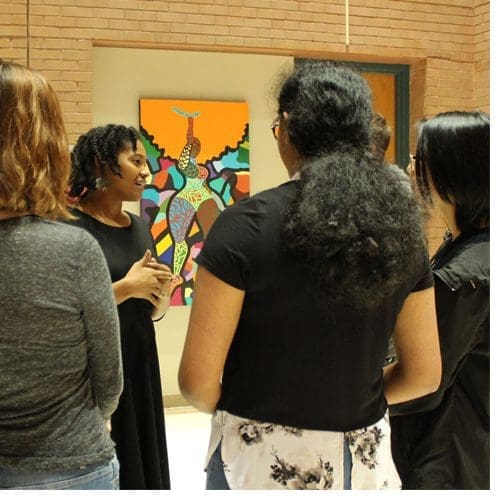 NCSSM endowments fund arts opportunities for students: Students chat with Durham artist Candy Carver at the opening of Carver's art exhibit "You Are Going to Be Fine."