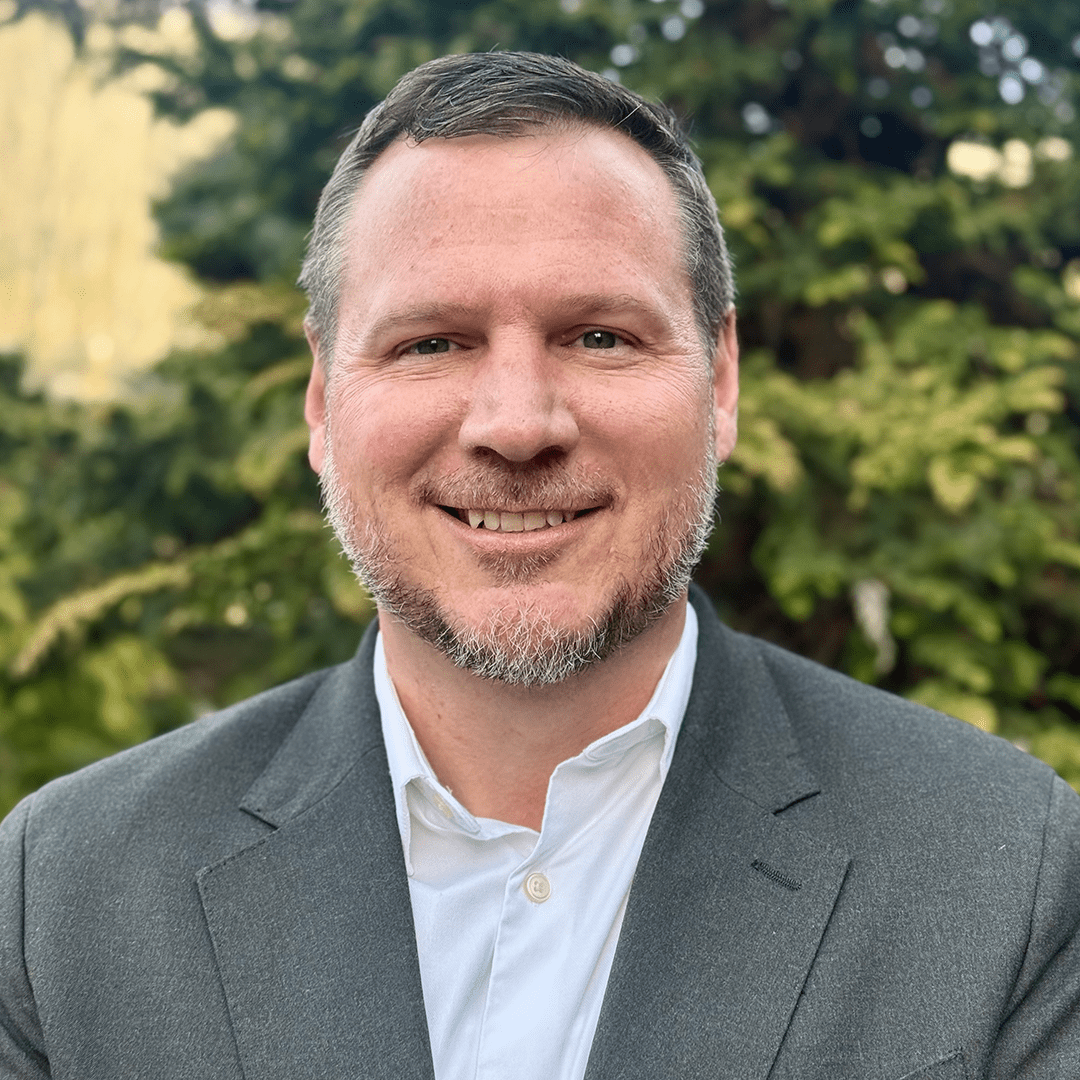 Smiling headshot of Dr. John Paul Jameson