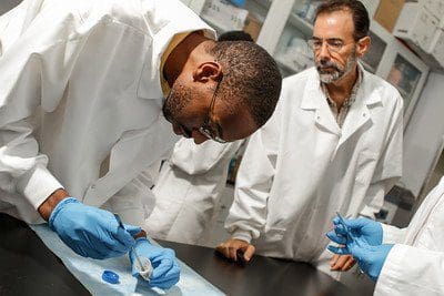 Dr. Ben Bahr and student doing research in a lab