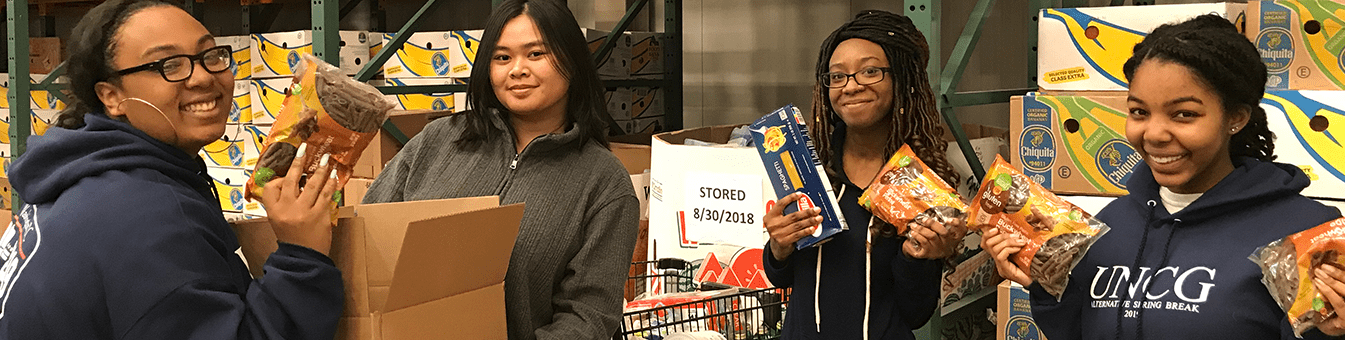 UNCG Students volunteering (Featured Image)