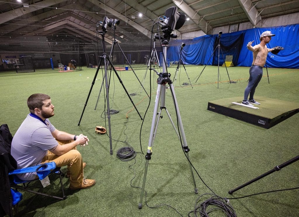 A pitcher stands in front of the cameras that will record his motion