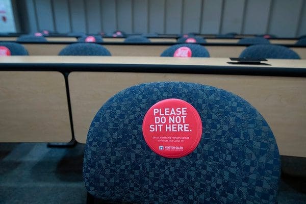 Classroom chairs marked for physical distancing