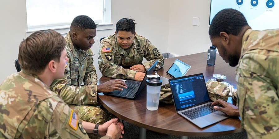 Four military students studying