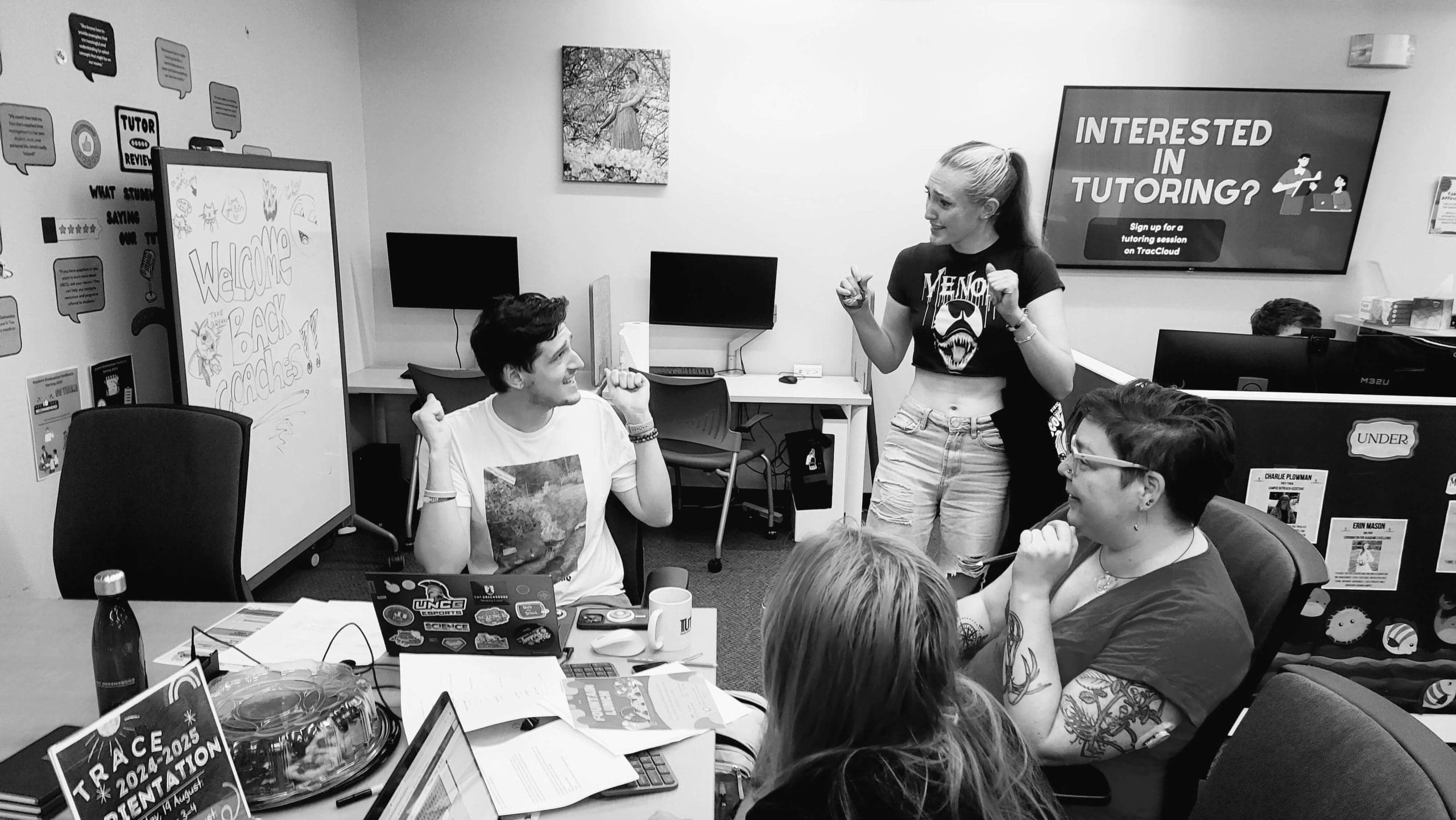 A group of UNC Greensboro students speaking with their TrACE advisor.